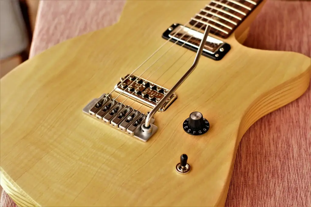 Alnico 5 magnet in electric guitar pickup.