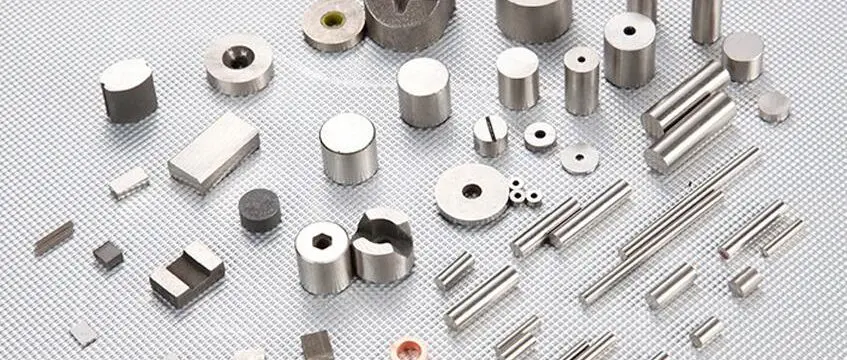 Collection of various Alnico magnet shapes (bar, horseshoe, ring) and their historical applications.