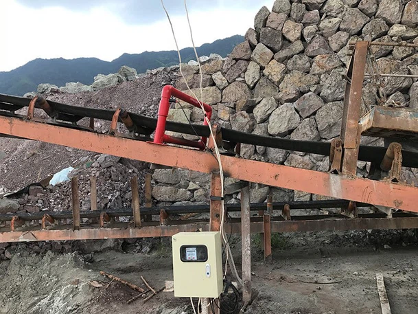 Cross belt separator in operation at a mining or mineral processing plant.