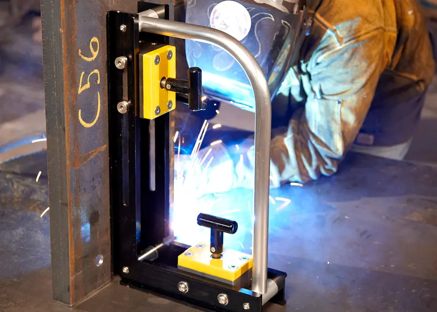 Magnets in welding machinery holding metal workpieces